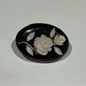 Vintage  Carved Lucite or Acrylic Black and White Floral Brooch